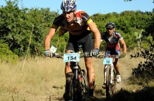 Port Elizabeth's own Tour de France veteran John-Lee Augustyn (back) chases eventual winner Matthys Beukes in this year's 80km Extreme mountain bike race at Addo. The 29th edition of The Herald VW Cycle Tour rolls out on February 1 and 2. Photo: Eugene Coetzee