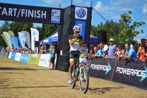 Newly crowned U23 African champion James Reid celebrates his solo victory in the 80km Extreme mountain bike race during The Herald VW Cycle Tour at Addo on Saturday. Photo: Full Stop Communications
