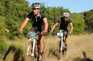 National marathon champion James Reid will return to defend his title in the Ultimate Quest category at The Herald VW Cycle Tour on February 1 and 2. Here Philip Buys (back) gives chase during this year's event. Photo: Eugene Coetzee