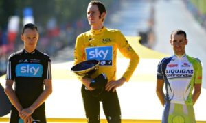 Sir Bradley Wiggins after winning the 2012 Tour de France. Chris Froome, left, the runner-up, won the Tour last year. Photo: AP Photo / Jerome Prevost