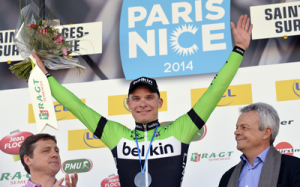 The Netherlands' Moreno Hofland celebrates on the podium after winning the second stage of the 72nd edition of the Paris-Nice cycling race, between Rambouillet and Saint-Georges-sur-Baulche, on Monday. Photo: AFP