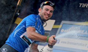 Mark Cavendish of Omega Pharma, leader of the Tirreno-Adriatico, celebrates on the podium in Cascina, near Pisa, after stage two. Photo: EPA