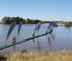 More than 800 riders rolled out from Heidelberg, just south of Johannesburg, on the 116km neutral opening stage of the nine-day Old Mutual joBerg2c on Friday. The mountain bikers crossed the Vaal Dam on a new 400m floating bridge en route to the finish at the Wilgerivier High School in Frankfort . Photo: Full Stop Communications