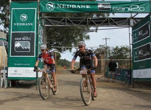 Mixed race leaders Ariane Kleinhans (left) and Lourens Luus took their second stage win for Team RECM on day two of the three-day Nedbank sani2c mountain bike stage race on Friday. Photo: Full Stop Communications