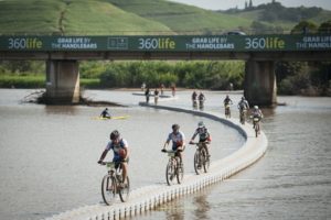 More than 4 350 mountain bikers will take on the 10th edition of the Nedbank sani2c in KwaZulu-Natal next week. The three-day stage race starts in Underberg and crosses a number of floating bridges en route to the finish at Scottburgh. Photo: Cheri Vale