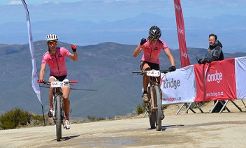 Anika Langvad (left) and Ariane Kleinhans celebrate winning stage two of the 2013 Bridge Cape Pioneer Trek. They have confirmed they will defend their women's title at the 2014 edition of the international stage race. Photo: Zoon Cronje / Nikon / XtreMedia