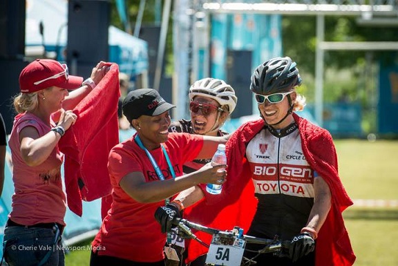 Robyn de Groot (right) and Catherine Williamson are greeted at the finish line of stage one of the FNB Wines2Whales after finishing the stage in second place. Photo: Cherie Vale / Newsport Media
