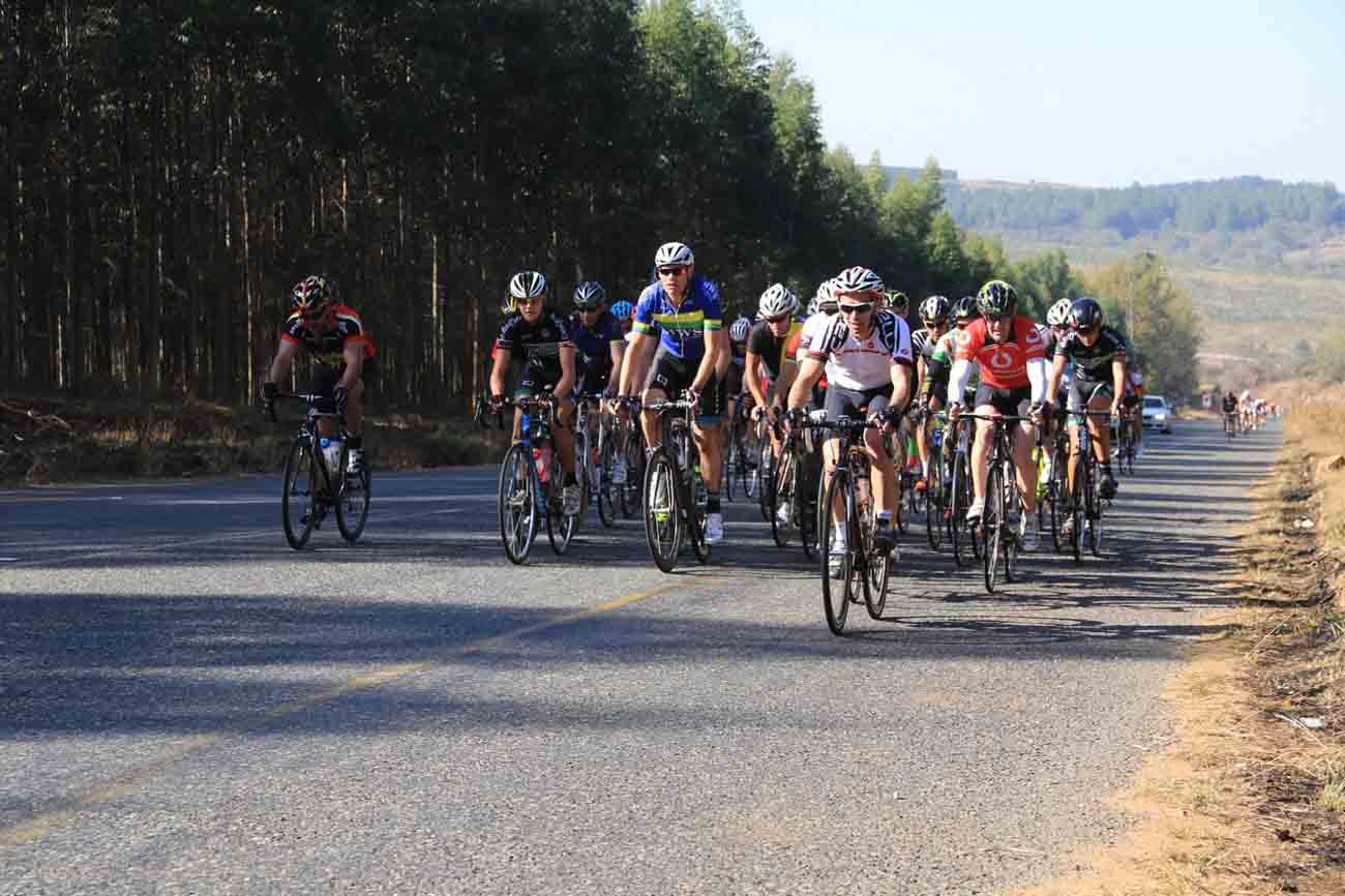 South African road champion in his age group Mark Spencer (striped jersey, centre) en route to winning the Bestmed Jock Classique in Mpumalanga on Saturday. Photo: Hendrik Wagener