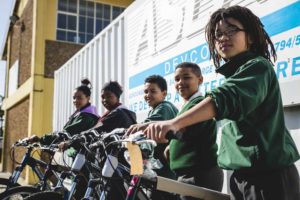 : Learners of the Botriver Primary School taking delivery of the bicycles. Photo Credit: Ewald Sadie