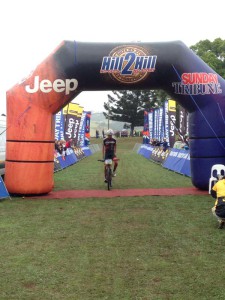 Brandon Davids crosses the finish line to win the 2015 Hill2Hill MTB Marathon