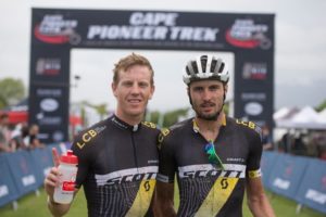 South Africans Matthys Beukes (left) and Gert Heyns of SCOTT Factory Racing LCB 2 pose for a winner's shot after Stage 1 of the Cape Pioneer Trek from Mossel Bay to George, South Africa on Monday. Photo credit: Zoon Cronje/Nikon 