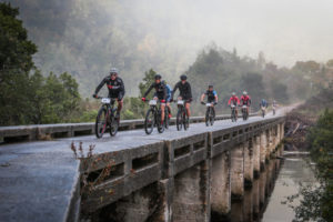 The race leaders crossing the Storms River during day three of the Storms River Traverse. Photo by: Oakpics.com