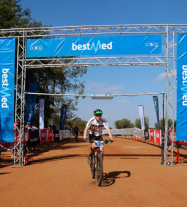 A rider crossing the finish line at the Sondela MTB Classic.