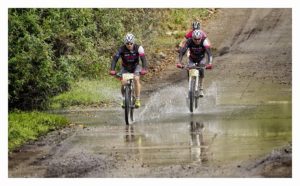 Bestmed Mitas Men with Yolande de Villiers on route during the first race of the Trans Baviaans.