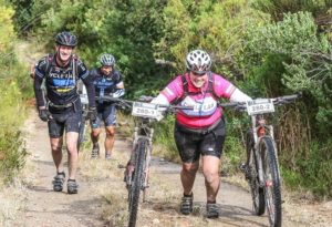 Some riders making their way up on a technical section during stage two of the Storms River Traverse.