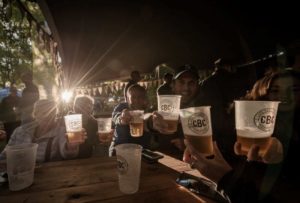 An image of some of the Berg and Bush 'Great Trek' riders relaxing with a beer after stage one.