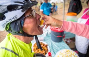 An image of a rider enjoying some of the treats that were available at the waterpoints on stage two of the Berg and Bush 'Great Trek'.
