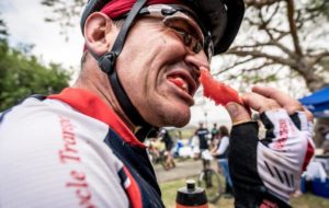 Pictured here is one of the Berg and Bush 'Descent' riders enjoying some watermelon at one of the waterpoints on day one.
