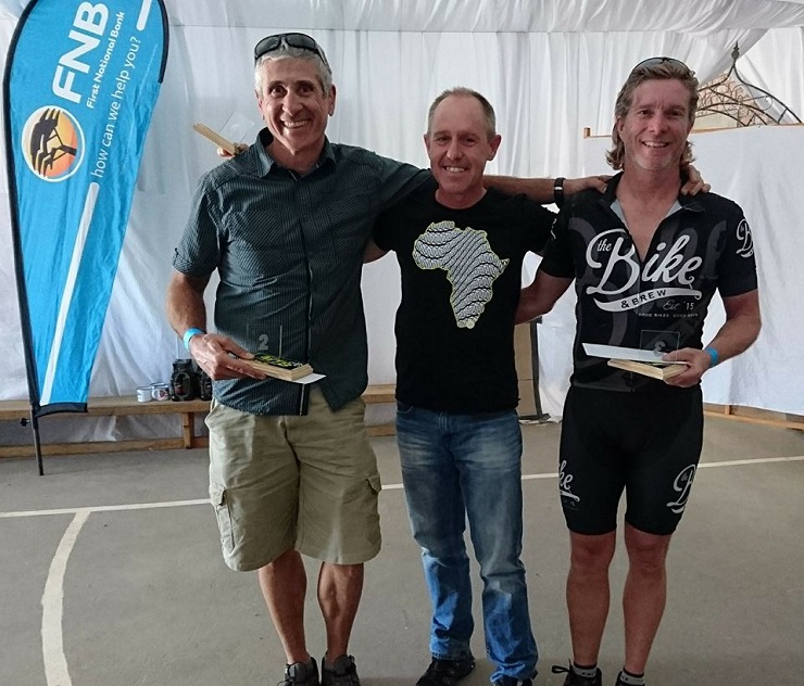(l-r) Didier Duc (second), Charl Joubert (first) and Richden Jute (third) after the Langkloof MTB Challenge today. Photo: Facebook/EastCapeMTB