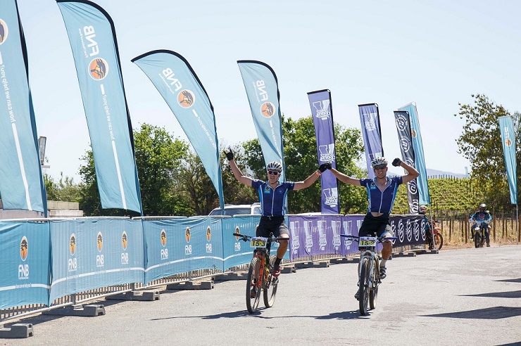 UCT's Luke Evans (left) and Martin Freyer cross the finish line first on the second day to win the overall men's title at the FNB-sponsored Varsity MTB Challenge, which started and finished at Nederburg near Cape Town today.