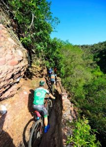 Riders make their way through a narrow section of the Trailseeker route.