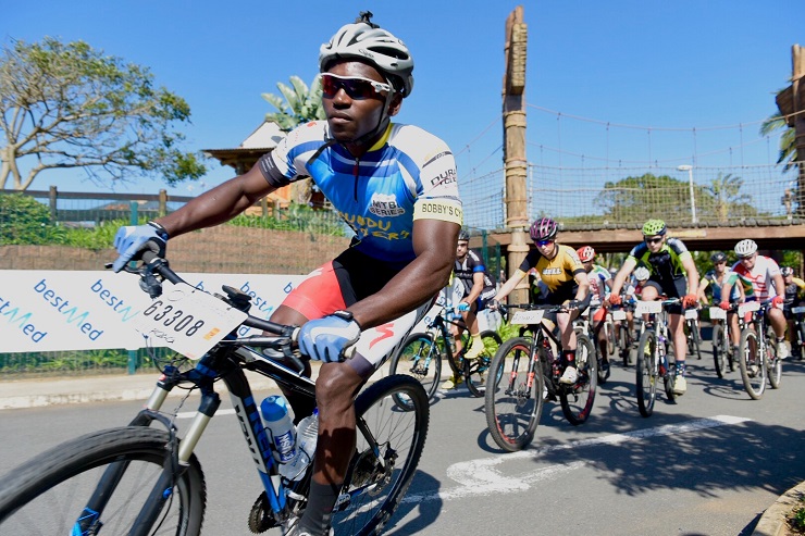 Winner Lindani Shusha, of Port Shepstone, leads the bunch at the start of the 40km race in the Bestmed Wild Coast Sun MTB Classic near Port Edward in KwaZulu-Natal today.