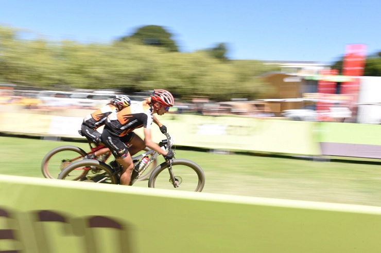 Investec-Songo-Specialized's Annika Langvad and Kate Courtney pictured making their way into the race village in stage four of the Cape Epic in Wellington today. Photo: Cape Epic