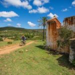 Riders going past magnificent ruins during the PE Plett. Photo: Deidre Cloete
