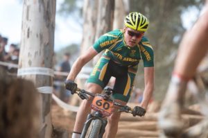 Pieter du Toit showing off his South African colours during the men's under-23 race at the UCI Mountain Bike World Cup in Stellenbosch. Photo: Shannon Valstar