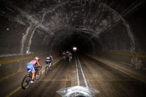 Riders taking on a dark tunnel during stage three of the Tour of Good Hope. Photo: Robert Ward