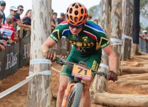 An image of a South African mountain biker in action at the first leg of the 2018 UCI Mountain Bike World Cup.