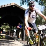 Rider taking on a bridge during the Cradle Traverse third stage yesterday. Photo: Sage Lee Voges/ZC Marketing Consulting