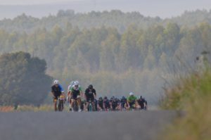 Riders reaching the top of a climb on stage three of the Panorama Tour.