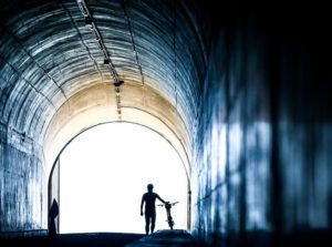 A rider walking through the Orange Fish Tunnel on the final Trek 2 Teebus stage.