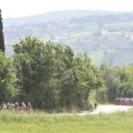 The peloton chases after the leading bunch on stage nine of the Giro d'Italia