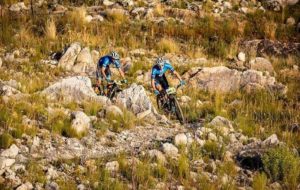 Riders going down a rocky slope during stage two of the Gravel & Grape Extreme 3-day. Photo: Chris Hitchcock