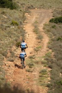 A team riding solo and taking on a bumpy jeep track during stage two of the Great Zuurberg Trek. Photo: Shayne Minott