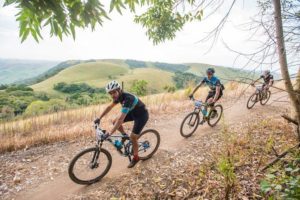 Riders coasting on the edge of a hill during the sani2c Race. Photo: Anthony Grote