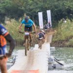 Riders crossing a wavy bridge during the sani2c Race. Photo: Anthony Grote
