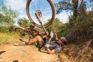 Close up of a rider taking a fall during the sani2c Race. Photo: Anthony Grote