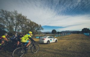 Riders are led out of the start on day one of sani2c Adventure