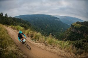 A rider enjoys a beautiful view of the mountains on day two of sani2c Adventure.