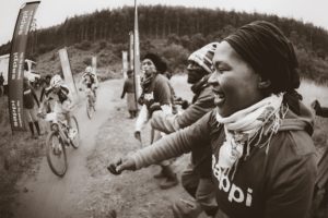 Spectators cheer on riders during day two of sani2c Adventure.