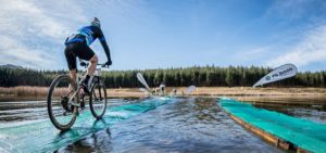 A crocodile pops up at the water bridge on day one of sani2c Adventure