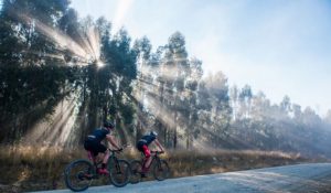 Riders on an open gravel road during day one of the sani2c Race