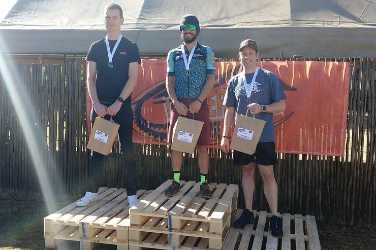 Dewald Lotter (middle) said he was just glad to have survived after winning the gruelling 299km Waterberg Traverse. Photo: Supplied