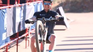 A rider giving a wheelie on day two of the Liberty Waterberg Encounter