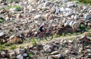 A rider moving up a rocky ascent during stage three of the Dr Evil Classic. Photo: oakpics.com
