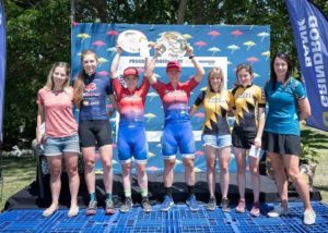Women's team podium: Team dormakaba SA's Amy McDougall and Samantha Sanders in first (middle), flanked by Bell Equipment's Hayley Smith and Christie Hearder in second (left) and De Natte Boer's Andrea de Boer and Elmari de Wet in third (right). Photo: Em Gatland/Nikon