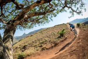 A rider moving swiftly down a descent during stage one of the Berg and Bush 'Great Trek'. Photo: Em Gatland
